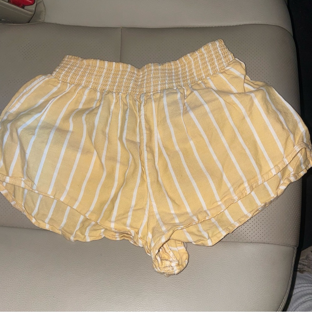 yellow flowy striped shorts